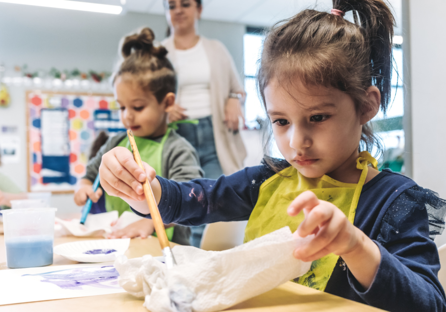 two prek kids painting