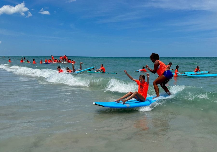 Cowabunga Campers surfing to shore