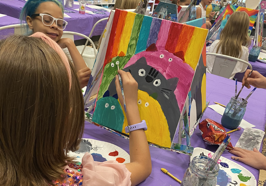 girl painting cats on a canvas at Createry Workshop Highlands Ranch