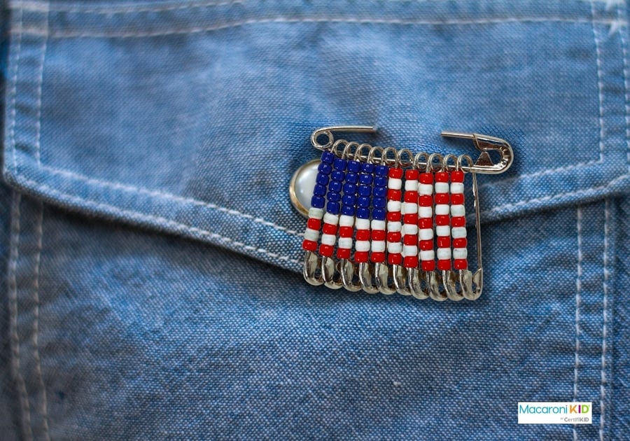 Flag pin on denim shirt pocket