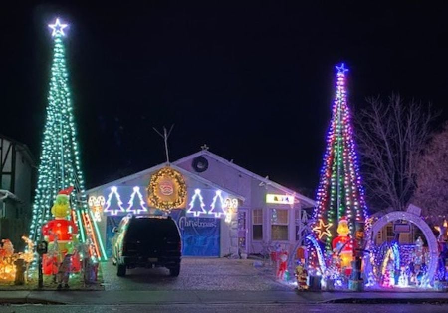 A well lit house decorated for Christmas