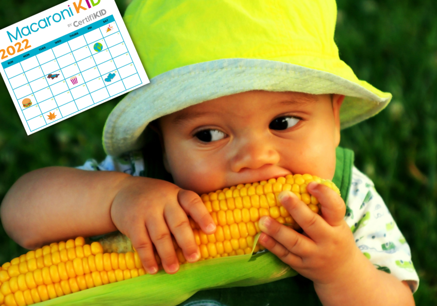 baby eat corn with MK calendar image in corner