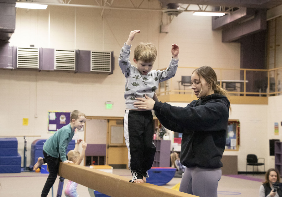 young child on a balance beam at Goodson Recreation Center