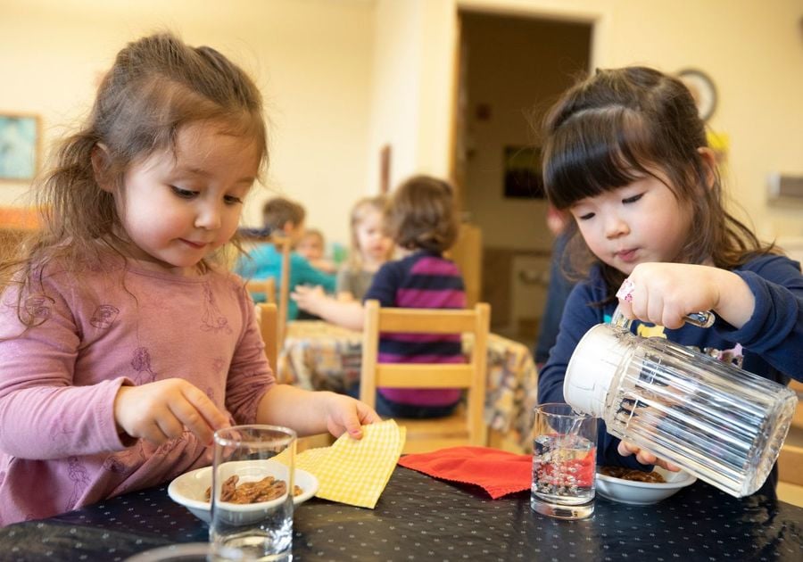 two prek girls having snack