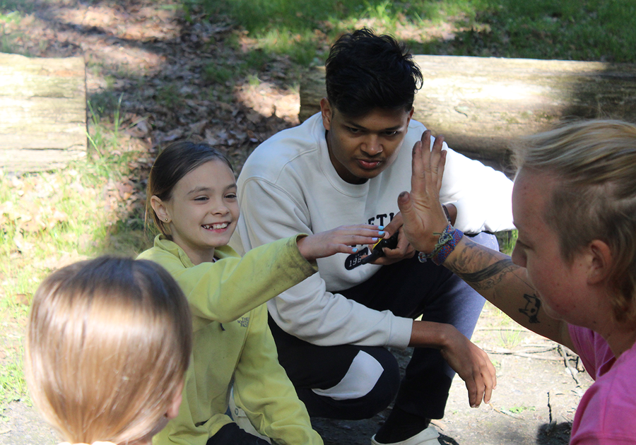 camper giving a high five