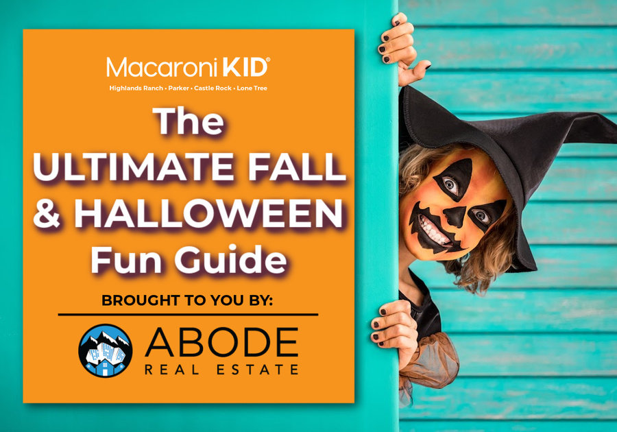 girl dressed as a witch peeking out from behind a wall that says the ultimate fall & halloween fun guide brought to you by macaroni kid and abode real estate