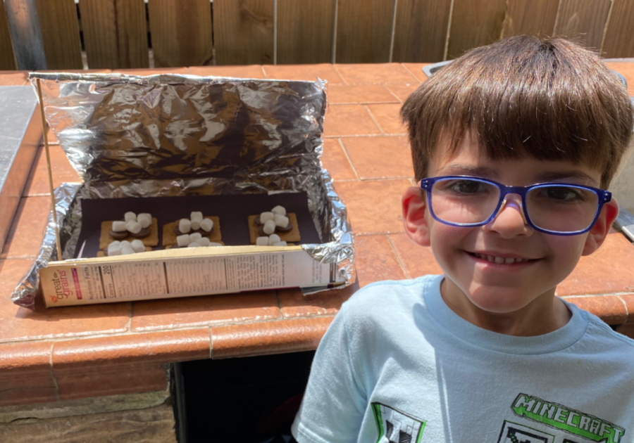 Publisher Courtney Jennings son uses a solar s'mores oven