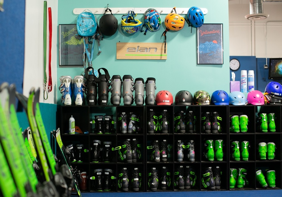 wall of ski equipment