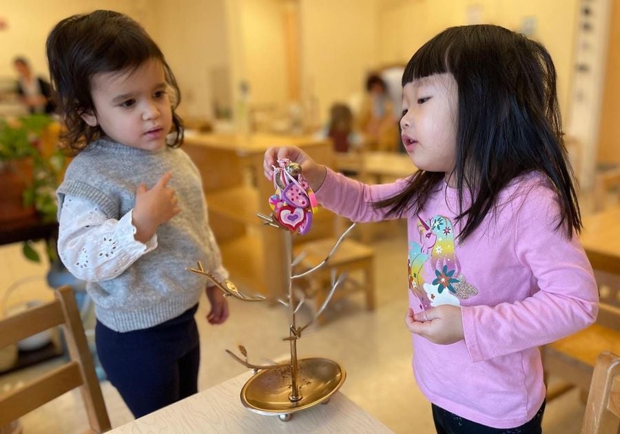 two preschool girls playing