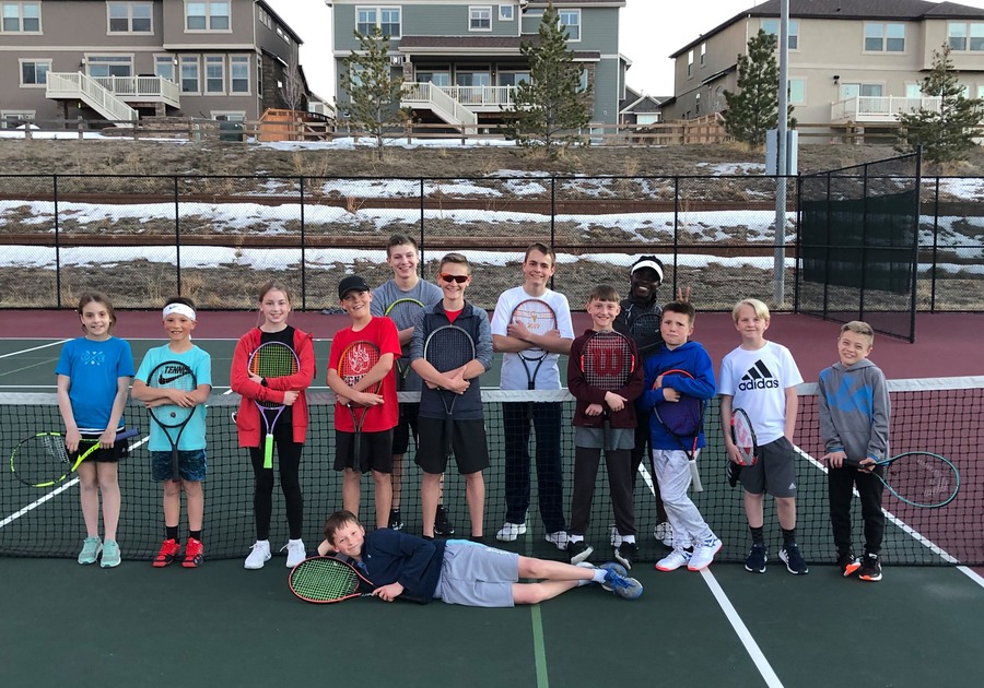 group photo of youth tennis group lesson