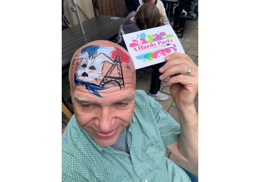 man with head face painted