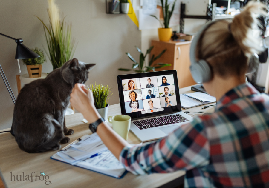 woman with cat working from home