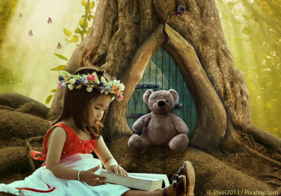 Girls Reading Book to stuffed bear in fantasy like world