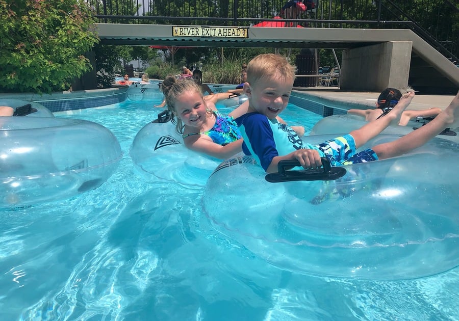 children floating in the lazy river at Pirates Cove