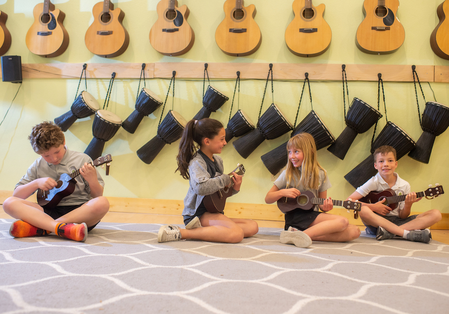 children in music class at aspen academy