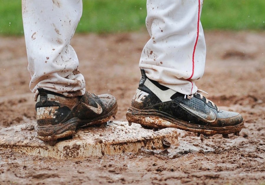 photo of muddy baseball cleats