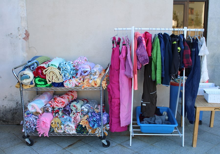 Rack of clothes and blankets