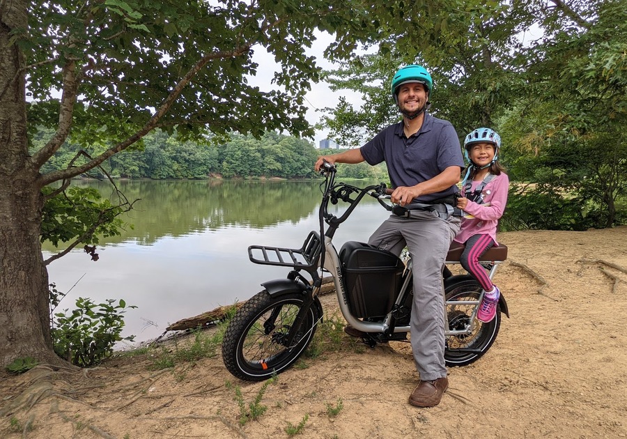 Dad and daughter on bike