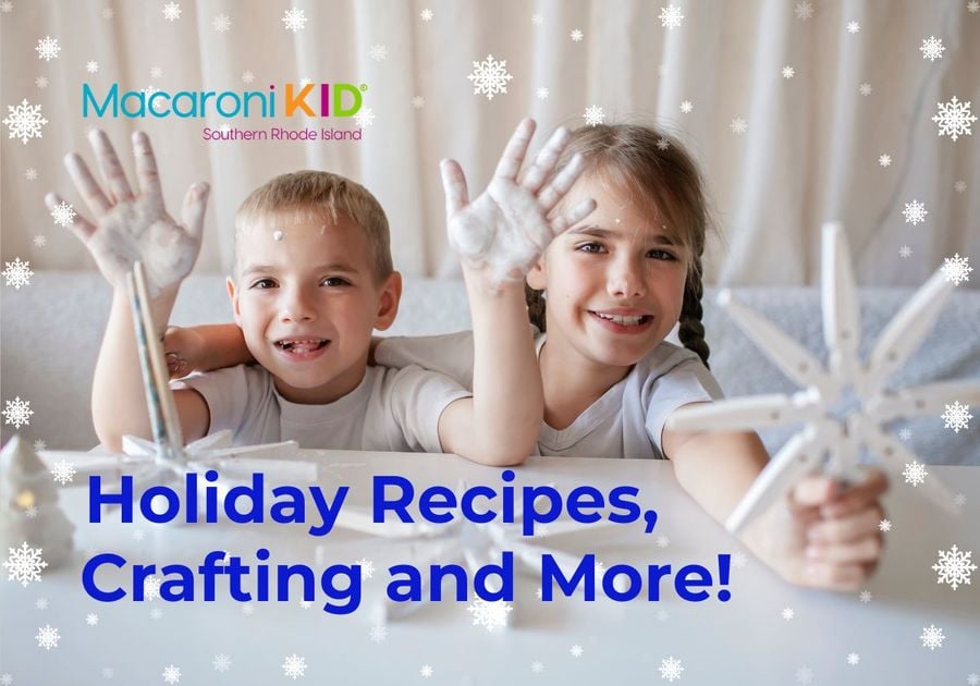 Two children showing their snow crafts to you!  Boys hands are covered in white paint and girl has clothpin snowflake