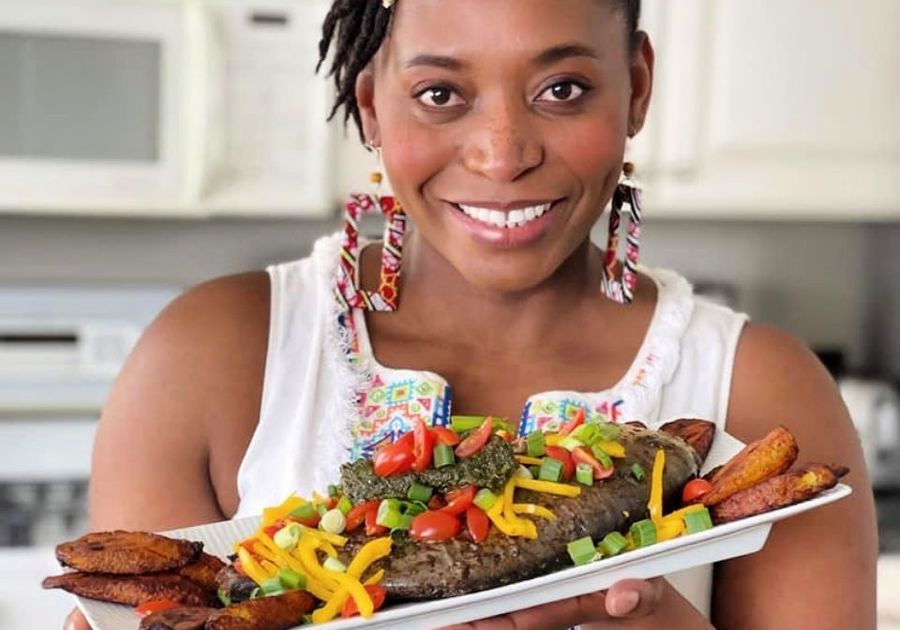 woman holding African dish