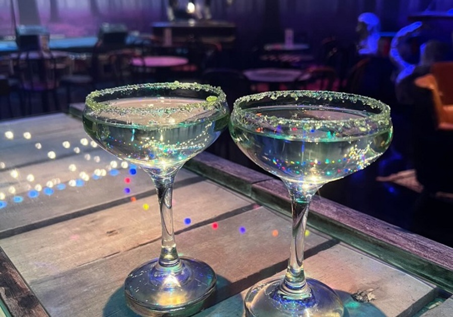 two cocktails with edible glitter