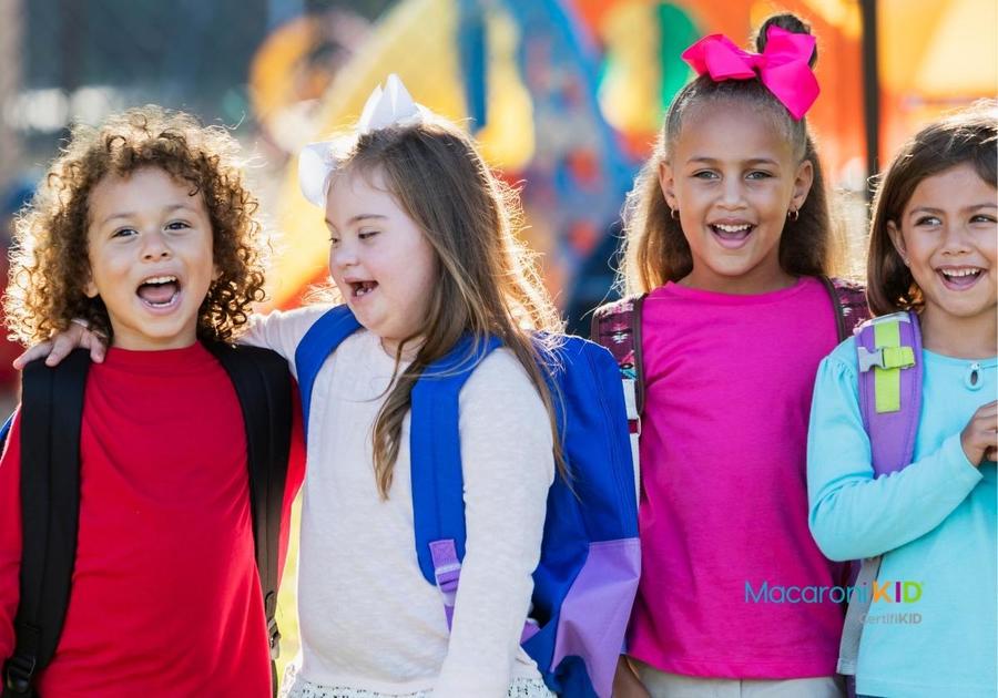 Multi-ethnic school children, girl with down syndrome