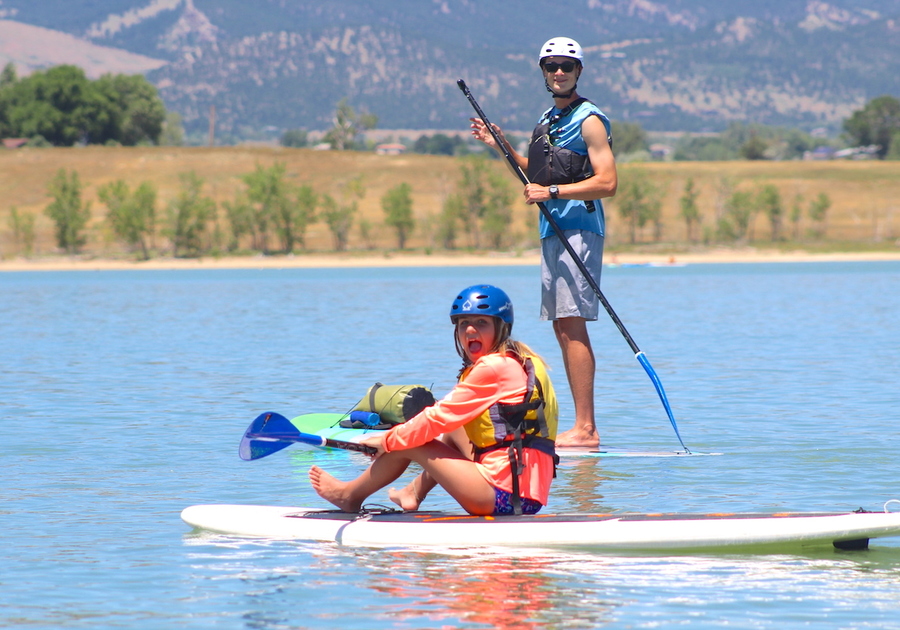 teens on paddleboards at Community Sailing of Colorado Summer Camp