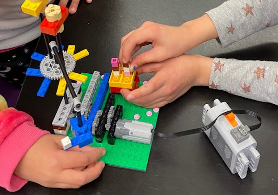 children making a robotic out of legos