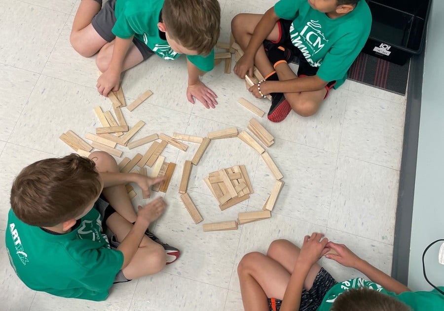 kids building with keva planks