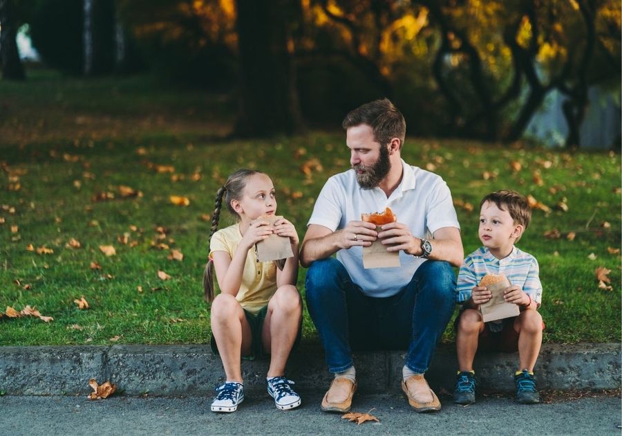 Father with Children Eating
