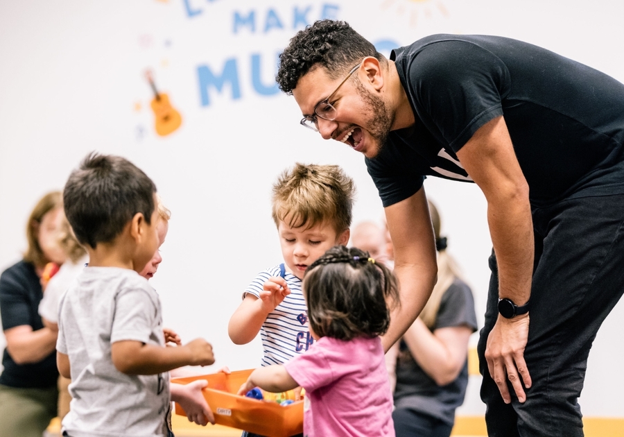 teacher with three toddlers