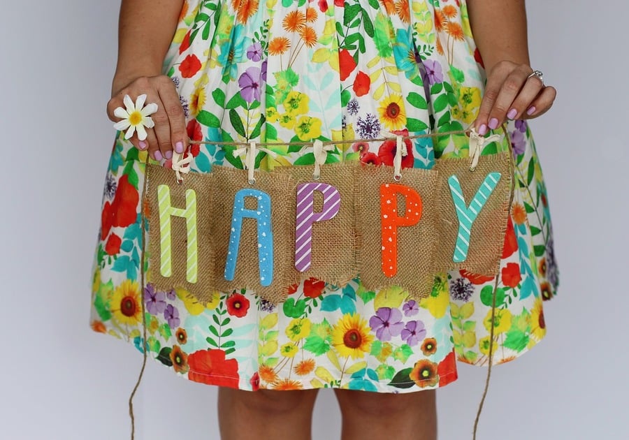 happy sign with spring dress