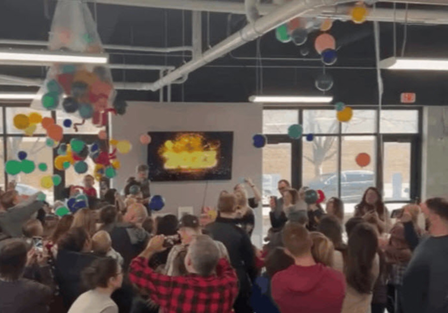 Balloon drop with children and parents