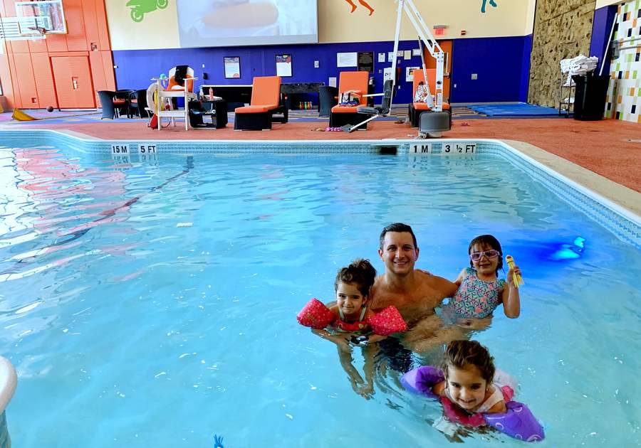 Family in pool