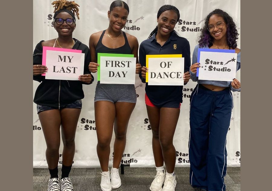 Older Dancers holding signs stating My Last First Day of Dance Stars Studio