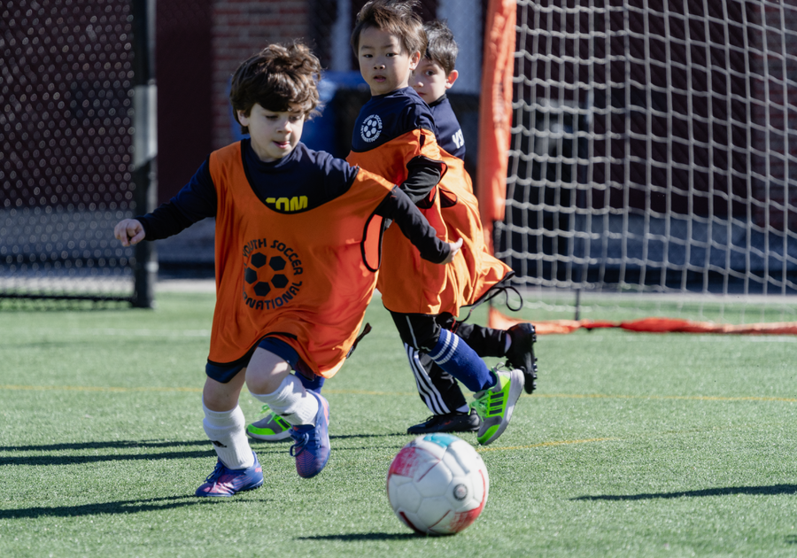 little boys playing soccer