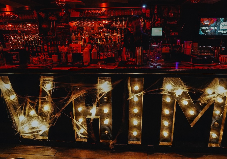 a bar with the word WHIM in lights