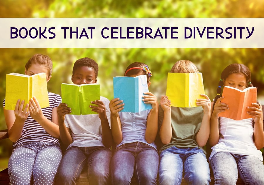 children of different ethnicities sitting on a bench reading books