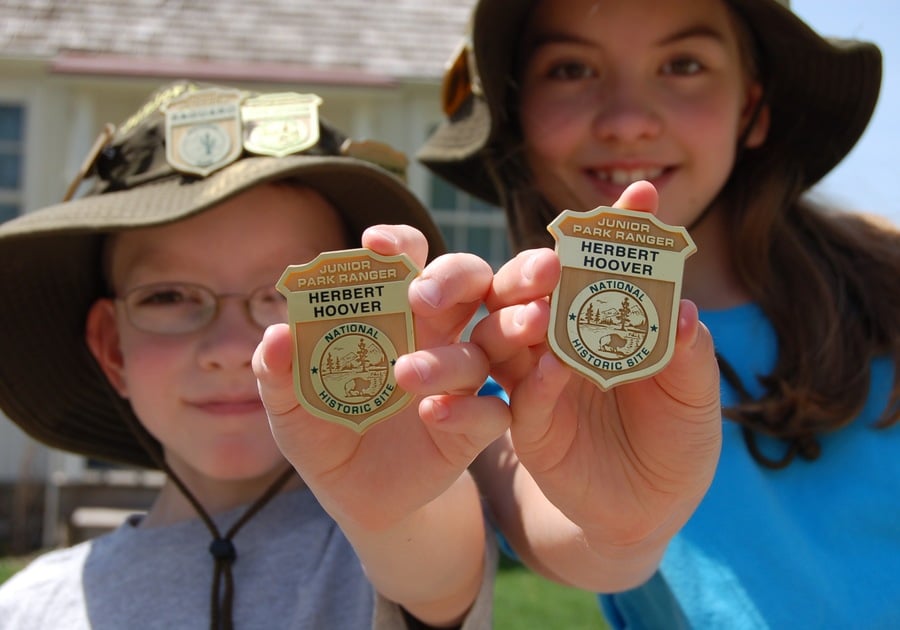 Junior Rangers can show off their badges from Herbert Hoover NHS and other national parks.