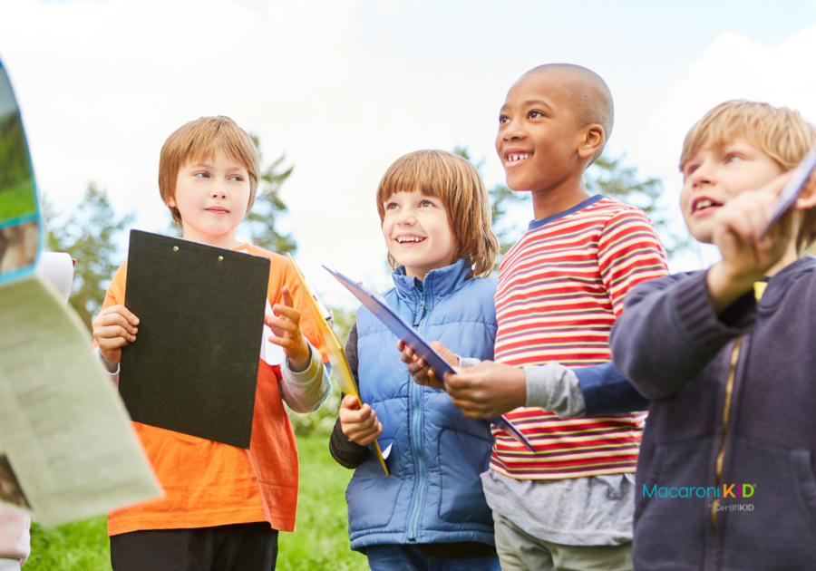 Children with Clipboards on Scavenger Hunt